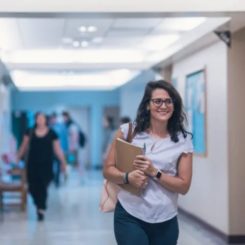 student walking down the hall