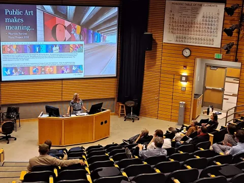 Leah Davis-Witherow giving talk in auditorium